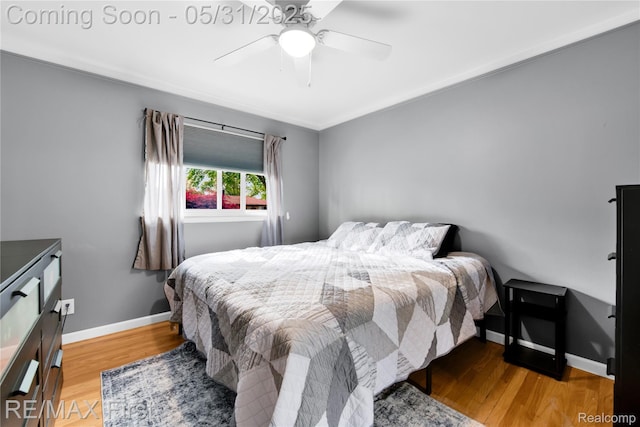 26242 Audrey Ave, Warren, MI 48091 - bedroom featuring wood finished floors, baseboards, and a ceiling fan