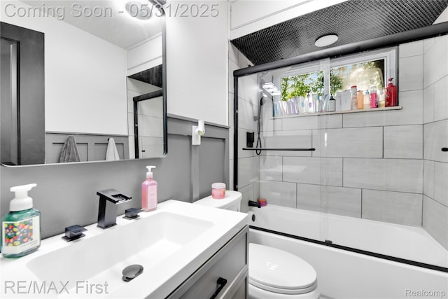 26242 Audrey Ave, Warren, MI 48091 - full bathroom featuring toilet, vanity, and combined bath / shower with glass door