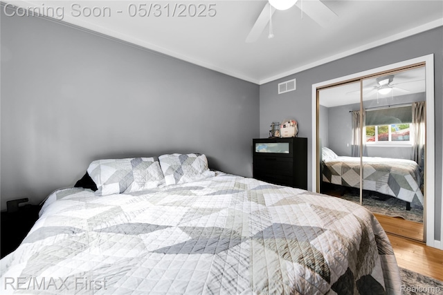 26242 Audrey Ave, Warren, MI 48091 - bedroom featuring wood finished floors, ceiling fan, and a closet