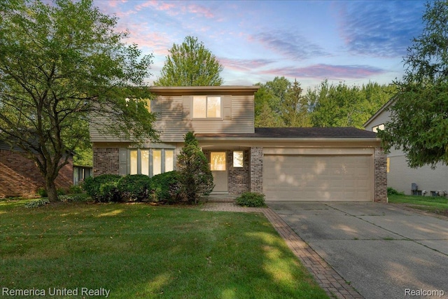 3455 Harmony Dr, Troy, MI 48083 - view of front facade featuring concrete driveway, brick siding, a garage, and a front yard