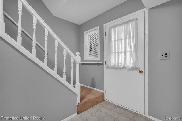 3455 Harmony Dr, Troy, MI 48083 - foyer with stairway and carpet flooring