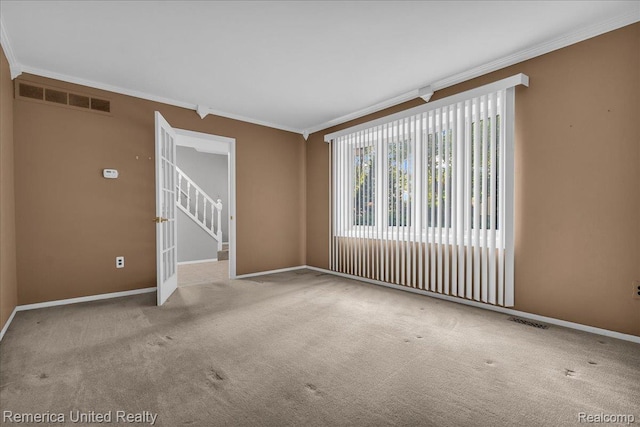 3455 Harmony Dr, Troy, MI 48083 - spare room featuring crown molding, carpet floors, and stairs