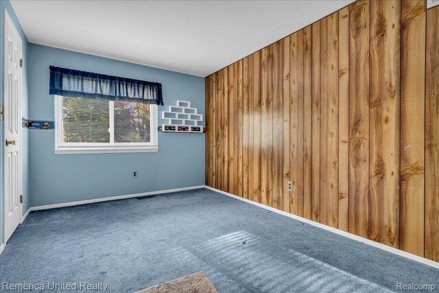 3455 Harmony Dr, Troy, MI 48083 - carpeted spare room with baseboards