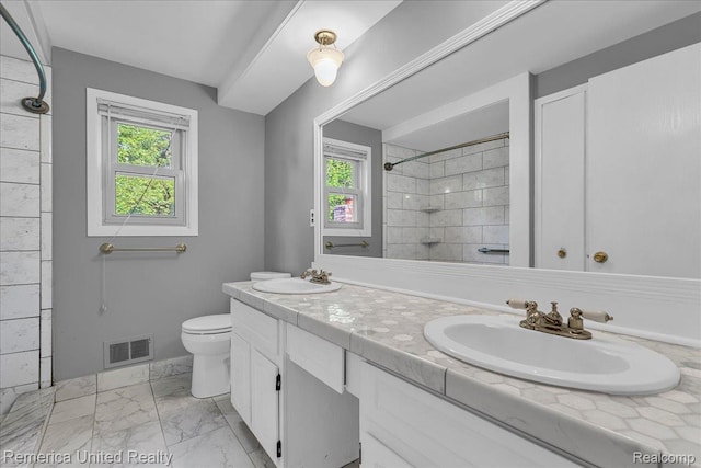 3455 Harmony Dr, Troy, MI 48083 - bathroom with double vanity, marble look tile flooring, and tiled shower