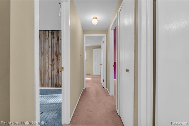 3455 Harmony Dr, Troy, MI 48083 - corridor with light carpet and baseboards