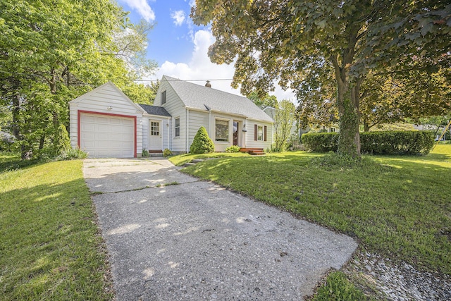 537 Wolverine Dr NE, Grand Rapids, MI 49505 - view of front of house with a shingled roof, an attached garage, a front lawn, and concrete driveway