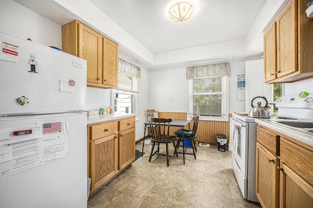 537 Wolverine Dr NE, Grand Rapids, MI 49505 - kitchen featuring white appliances and light countertops