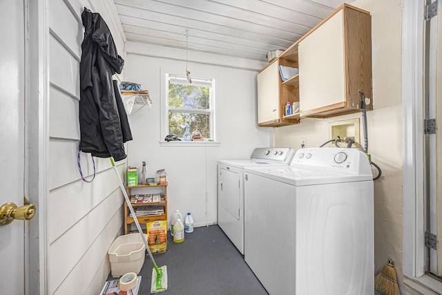 537 Wolverine Dr NE, Grand Rapids, MI 49505 - laundry room featuring cabinet space and washer and clothes dryer
