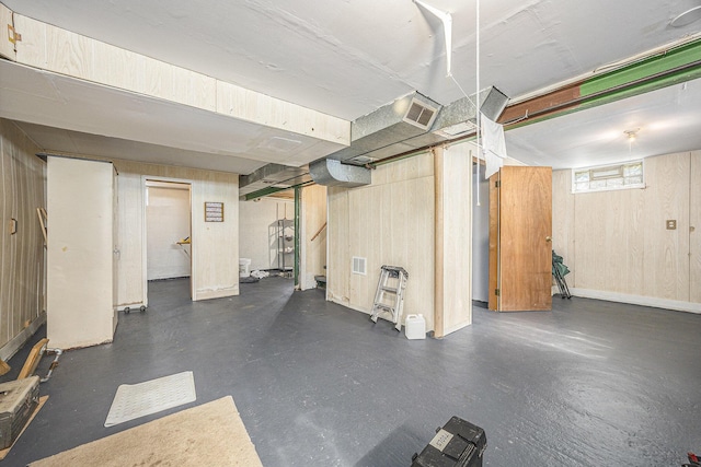 537 Wolverine Dr NE, Grand Rapids, MI 49505 - below grade area featuring wood walls