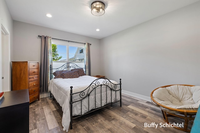 334 Terrace Point Cir Unit 33, Muskegon, MI 49440 - bedroom featuring wood finished floors, recessed lighting, and baseboards
