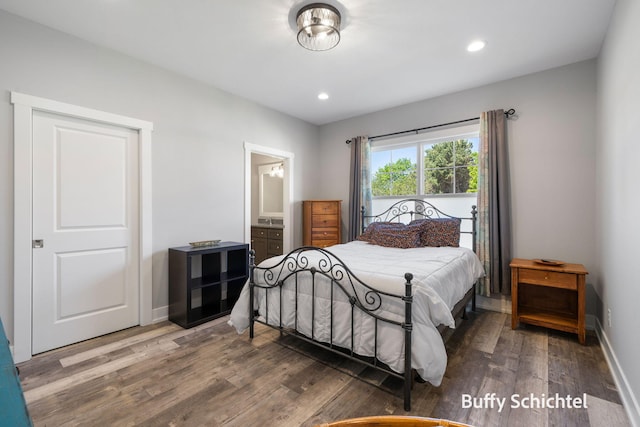 334 Terrace Point Cir Unit 33, Muskegon, MI 49440 - bedroom featuring wood finished floors, baseboards, recessed lighting, and ensuite bathroom