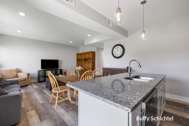 334 Terrace Point Cir Unit 33, Muskegon, MI 49440 - kitchen with a sink, open floor plan, stainless steel dishwasher, dark wood finished floors, and recessed lighting