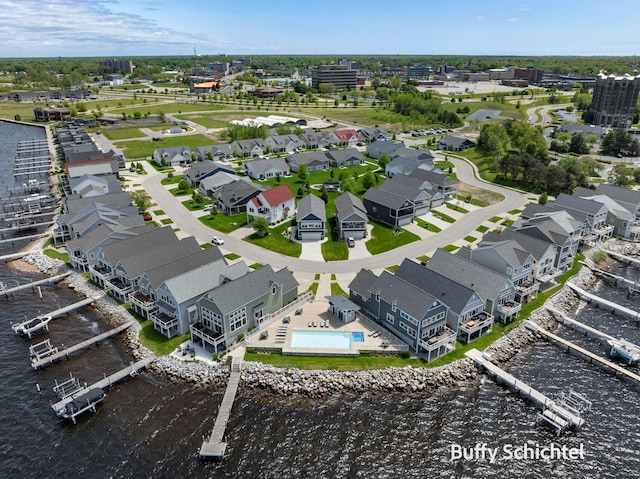 334 Terrace Point Cir Unit 33, Muskegon, MI 49440 - aerial view of residential area with a pool area and a large body of water