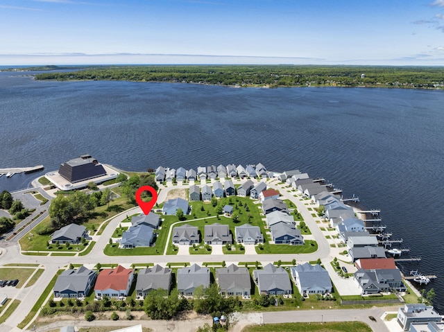 334 Terrace Point Cir Unit 33, Muskegon, MI 49440 - aerial perspective of suburban area with a nearby body of water