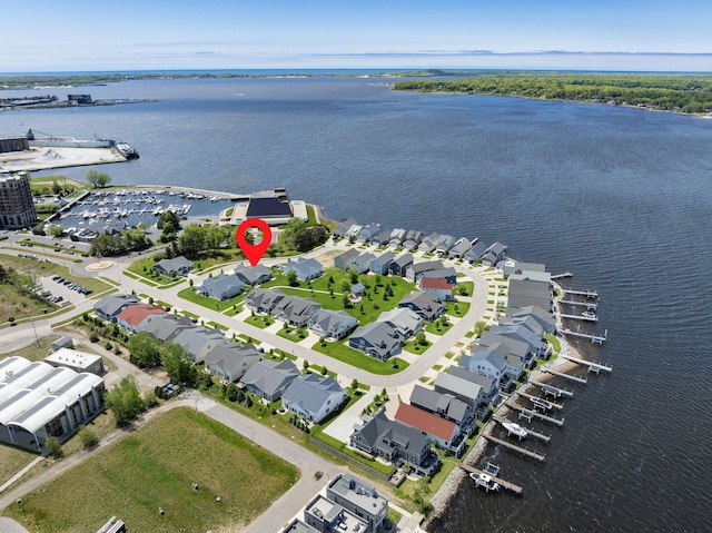 334 Terrace Point Cir Unit 33, Muskegon, MI 49440 - aerial view of property and surrounding area with a large body of water and nearby suburban area