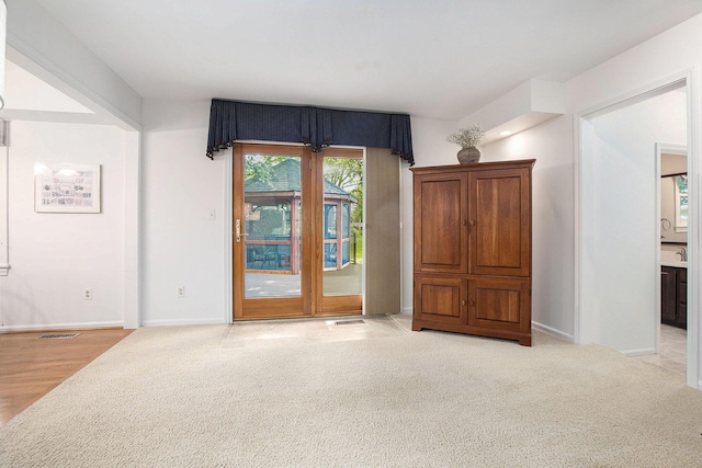 3509 Sulgrave Pl, Ann Arbor, MI 48105 - empty room with light carpet and baseboards
