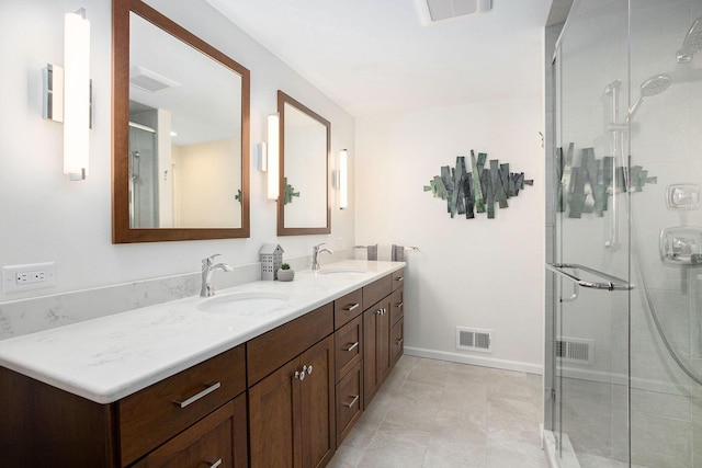 3509 Sulgrave Pl, Ann Arbor, MI 48105 - full bath with double vanity, a shower stall, and baseboards