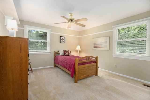 3509 Sulgrave Pl, Ann Arbor, MI 48105 - bedroom featuring multiple windows, carpet flooring, baseboards, and a ceiling fan