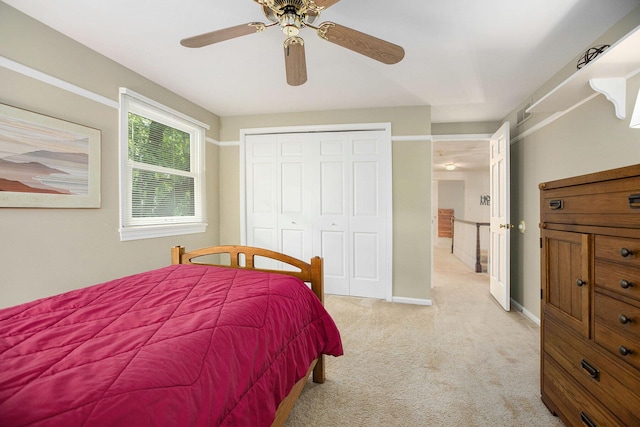 3509 Sulgrave Pl, Ann Arbor, MI 48105 - bedroom featuring light carpet, a closet, a ceiling fan, and baseboards