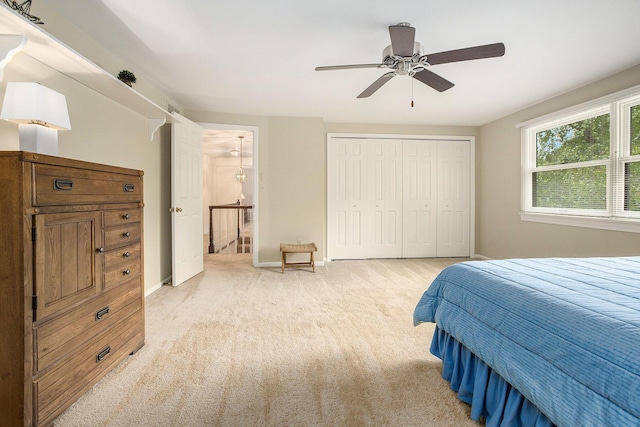 3509 Sulgrave Pl, Ann Arbor, MI 48105 - bedroom featuring light carpet, a closet, a ceiling fan, and baseboards