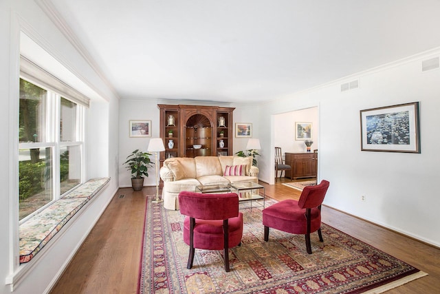 3509 Sulgrave Pl, Ann Arbor, MI 48105 - living area with ornamental molding, wood finished floors, and baseboards