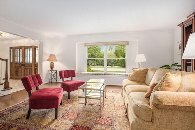 3509 Sulgrave Pl, Ann Arbor, MI 48105 - living room featuring wood finished floors, crown molding, stairs, and baseboards