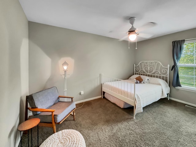4315 Astoria Ave SE, Grand Rapids, MI 49512 - bedroom with carpet, baseboards, and a ceiling fan