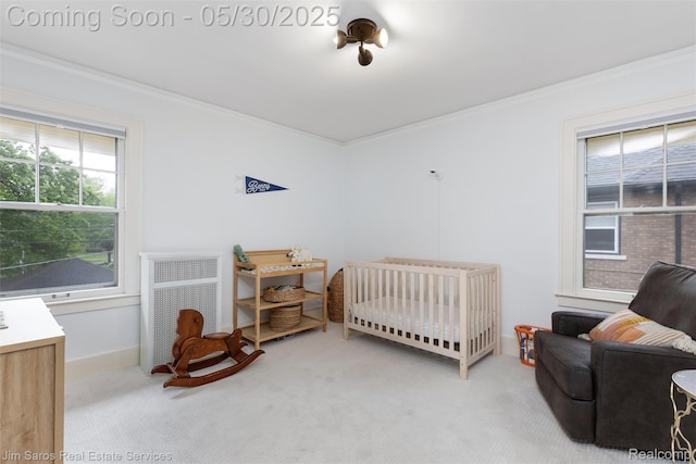 1377 Bishop Rd, Grosse Pointe Park, MI 48230 - bedroom featuring carpet floors, ornamental molding, a crib, baseboards, and radiator heating unit