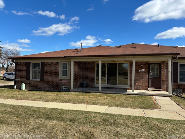 14764 Brewster Ct, Shelby Twp, MI 48315 - back of house featuring brick siding, a lawn, and roof with shingles