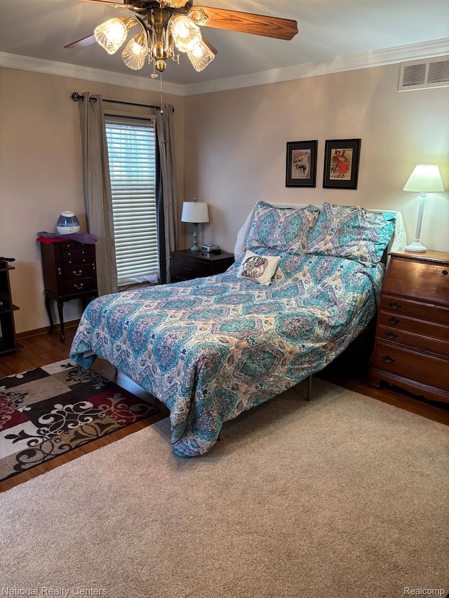 14764 Brewster Ct, Shelby Twp, MI 48315 - bedroom with crown molding, wood finished floors, and a ceiling fan