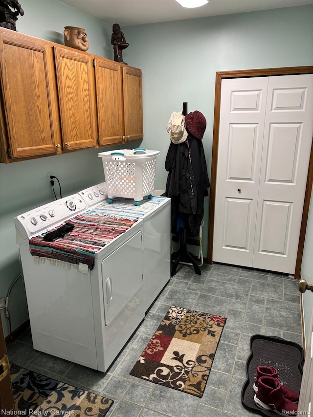 14764 Brewster Ct, Shelby Twp, MI 48315 - laundry room featuring cabinet space and separate washer and dryer