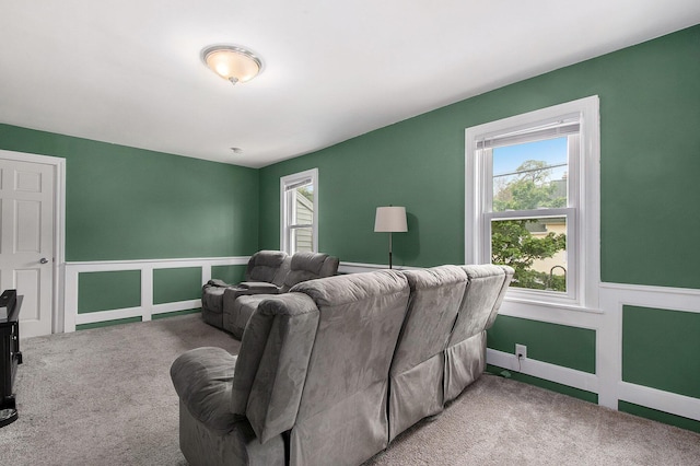 928 Baxter St SE, Grand Rapids, MI 49506 - home theater room featuring carpet flooring and plenty of natural light