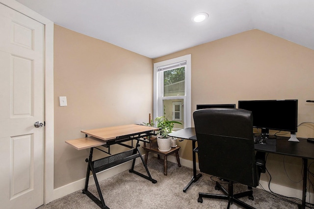 928 Baxter St SE, Grand Rapids, MI 49506 - carpeted home office with lofted ceiling and baseboards