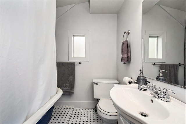 928 Baxter St SE, Grand Rapids, MI 49506 - bathroom featuring toilet, baseboards, a shower with curtain, tile patterned floors, and vanity