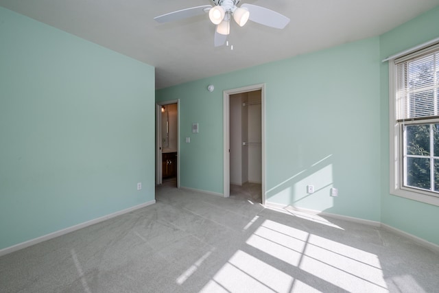 2184 Winters Way, Saint Joseph, MI 49085 - empty room with carpet floors, a ceiling fan, and baseboards