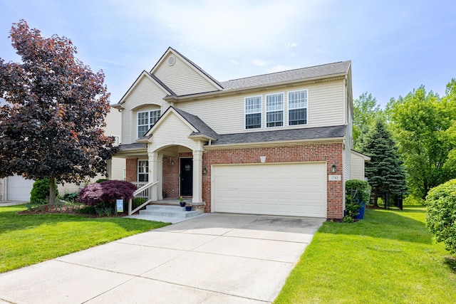 1743 Savannah Ln, Ypsilanti, MI 48198 - traditional-style house with an attached garage, concrete driveway, a front yard, brick siding, and a shingled roof