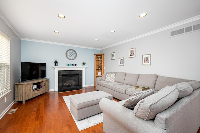 1743 Savannah Ln, Ypsilanti, MI 48198 - living area with recessed lighting, wood finished floors, ornamental molding, baseboards, and a high end fireplace