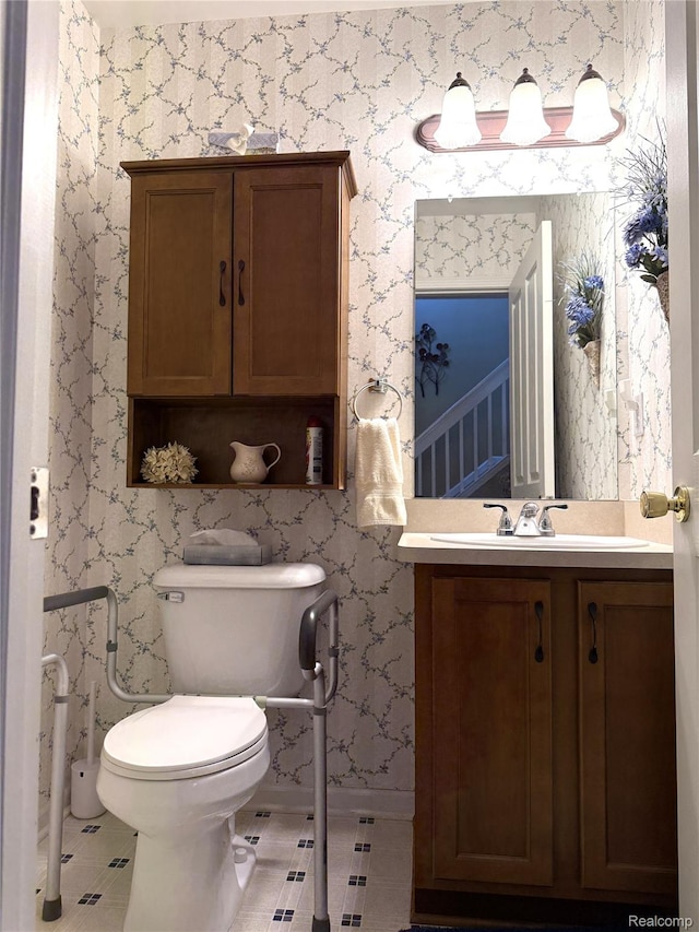 22693 Coachlight Cir, Taylor, MI 48180 - half bathroom featuring vanity, toilet, baseboards, and tile patterned floors