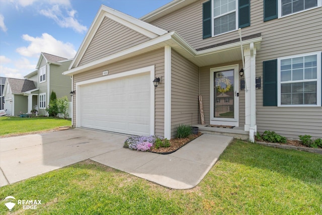 9416 Sunrise Ln, Davison, MI 48423 - property entrance with a lawn and driveway
