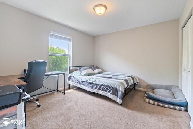 9416 Sunrise Ln, Davison, MI 48423 - carpeted bedroom featuring a closet, an office area, and baseboards