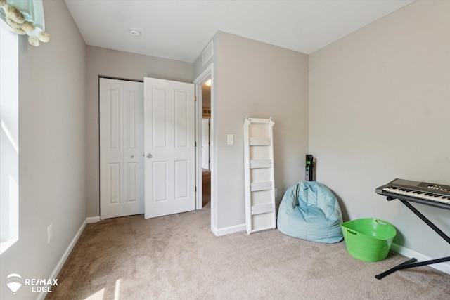9416 Sunrise Ln, Davison, MI 48423 - rec room featuring carpet and baseboards
