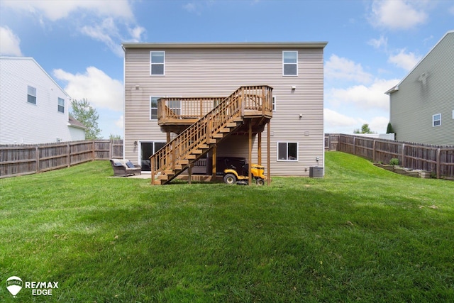 9416 Sunrise Ln, Davison, MI 48423 - back of property with stairway, a deck, and central air condition unit