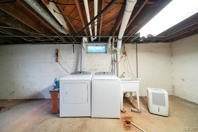 962 Vine St, Adrian, MI 49221 - basement featuring washing machine and clothes dryer