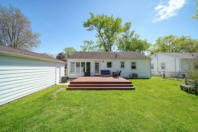 962 Vine St, Adrian, MI 49221 - back of property featuring a deck and central AC