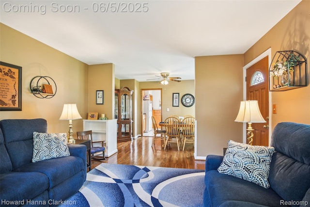 3414 Gregory Rd, Lake Orion, MI 48359 - living room featuring wood finished floors, a ceiling fan, and baseboards