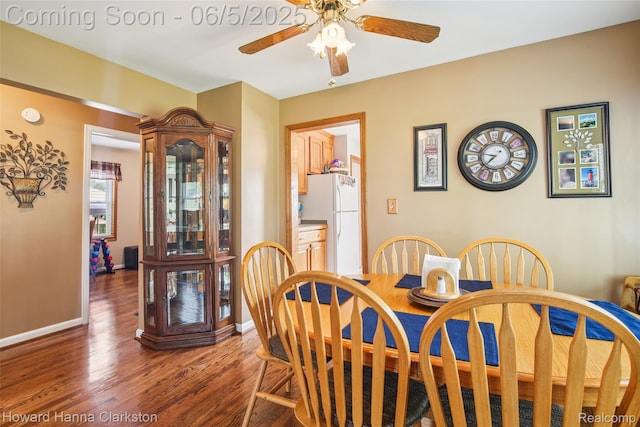 3414 Gregory Rd, Lake Orion, MI 48359 - dining room with a ceiling fan, wood finished floors, and baseboards