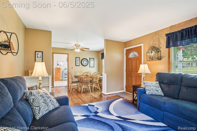 3414 Gregory Rd, Lake Orion, MI 48359 - living room with wood finished floors, ceiling fan, and baseboards