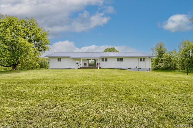 2680 N Lake George Rd, Metamora, MI 48455 - back of house featuring a yard and metal roof
