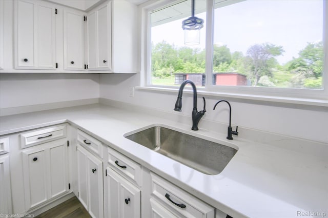2680 N Lake George Rd, Metamora, MI 48455 - kitchen featuring a sink, white cabinetry, and light countertops