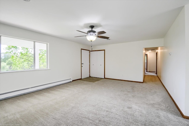 2680 N Lake George Rd, Metamora, MI 48455 - unfurnished bedroom featuring carpet floors, a baseboard radiator, baseboards, and ceiling fan